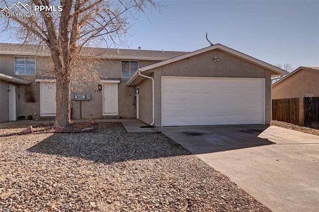 single story home featuring a garage