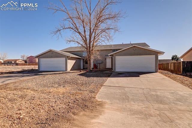 ranch-style home with a garage