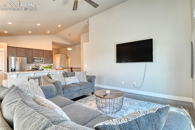 living room with ceiling fan, high vaulted ceiling, and wood-type flooring