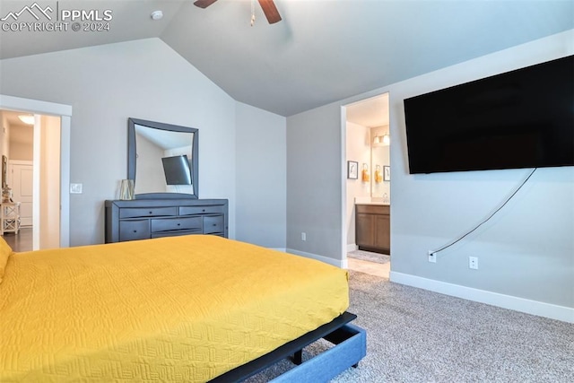 unfurnished bedroom with carpet flooring, ensuite bathroom, ceiling fan, and lofted ceiling