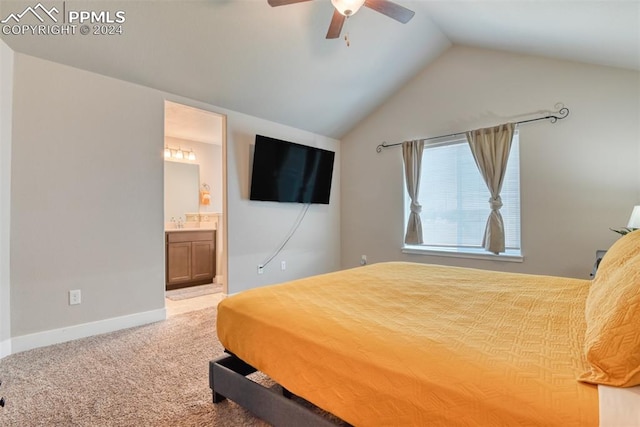 carpeted bedroom featuring connected bathroom, ceiling fan, and lofted ceiling