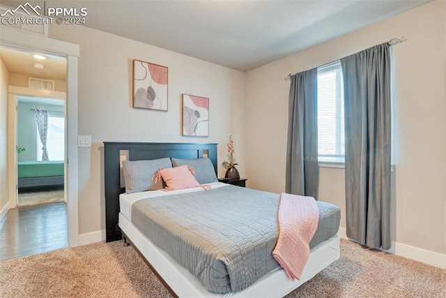 bedroom featuring carpet floors