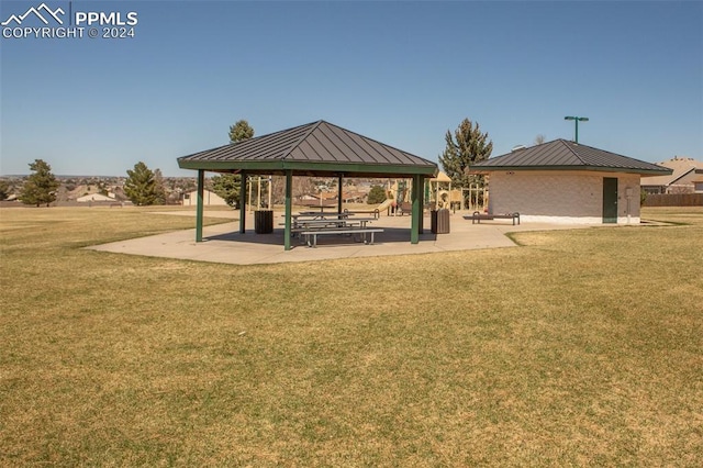 view of home's community with a gazebo and a lawn