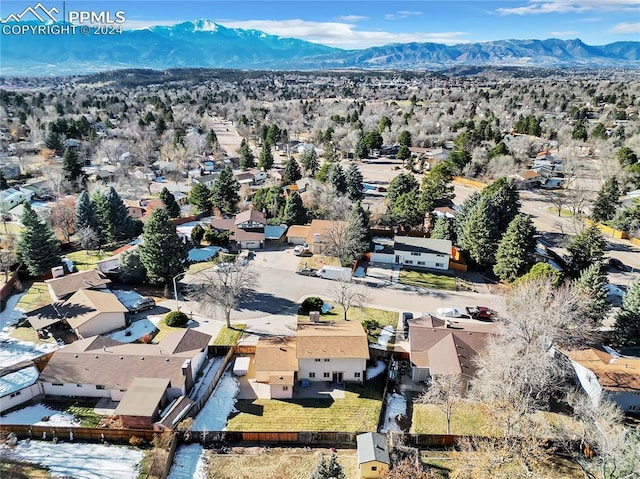 drone / aerial view featuring a mountain view