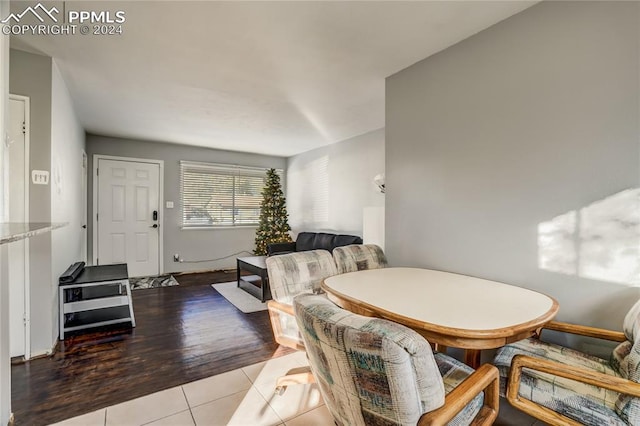 dining space with light hardwood / wood-style floors