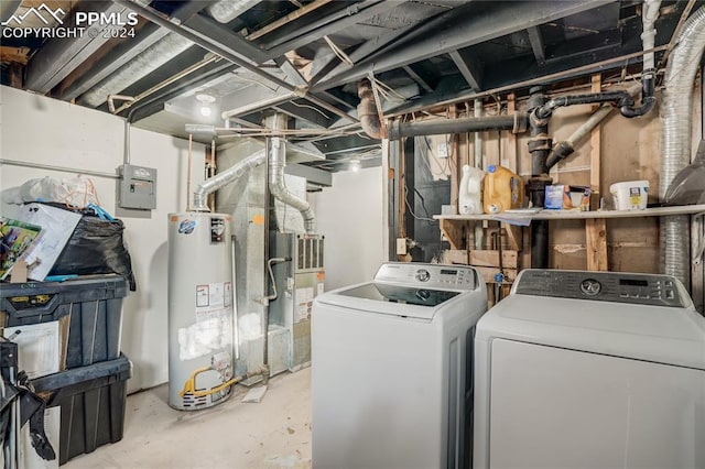 washroom with independent washer and dryer and water heater