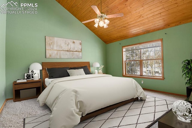 carpeted bedroom featuring ceiling fan, wood ceiling, and lofted ceiling