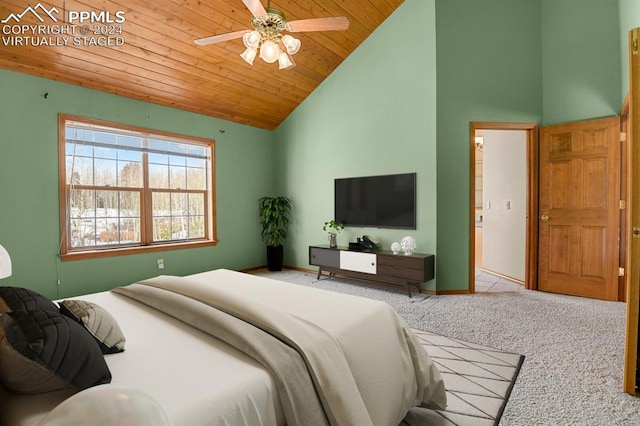 bedroom featuring light carpet, ceiling fan, wooden ceiling, and high vaulted ceiling