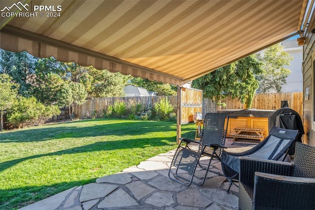 view of patio with a hot tub