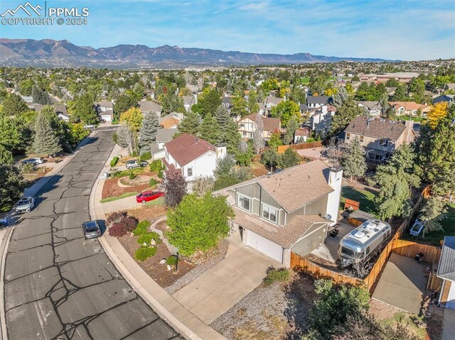 drone / aerial view featuring a mountain view