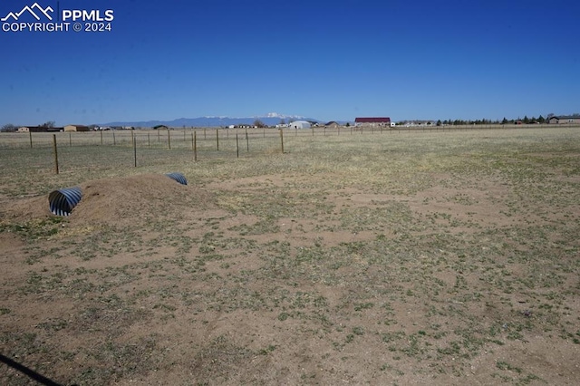 view of yard featuring a rural view