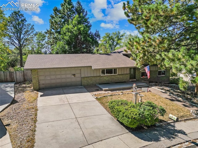 single story home featuring a garage