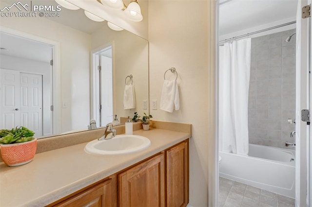 full bathroom with vanity, toilet, and shower / tub combo with curtain