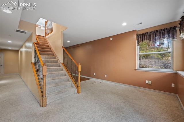 stairway with carpet floors