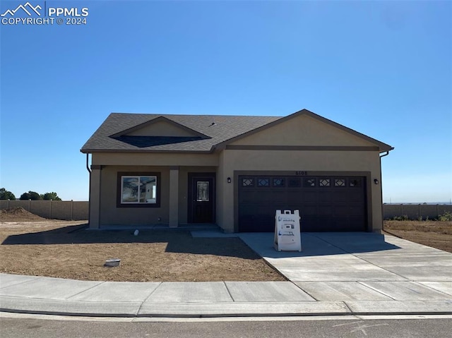 view of front of home featuring a garage