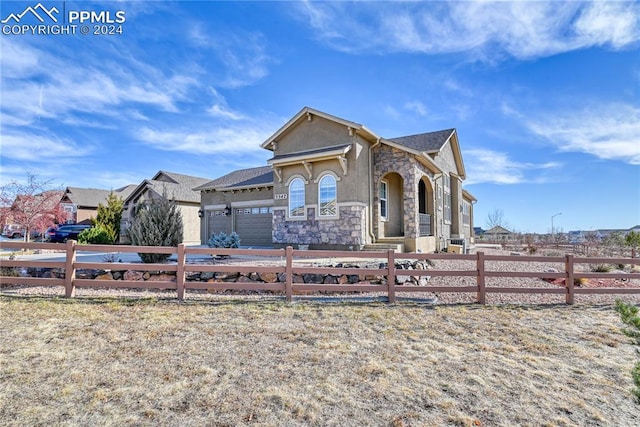 view of front of property featuring a garage