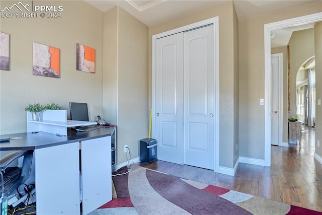 office space featuring dark hardwood / wood-style floors