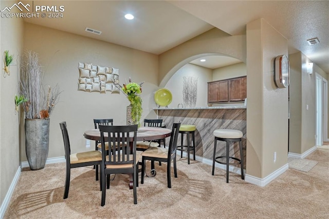 view of carpeted dining room