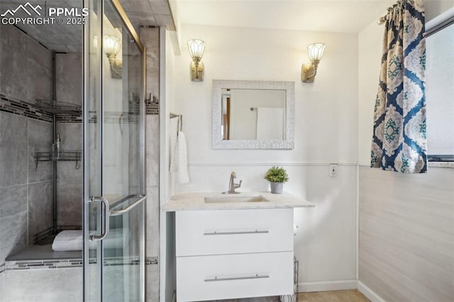 bathroom with vanity and walk in shower