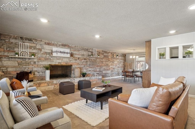 living room featuring light carpet, a stone fireplace, and a textured ceiling