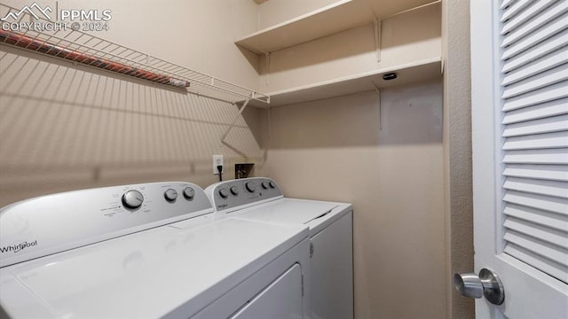 laundry area featuring separate washer and dryer