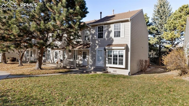 view of front of house with a front yard