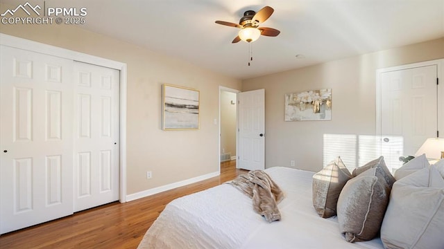 bedroom featuring ceiling fan and wood-type flooring