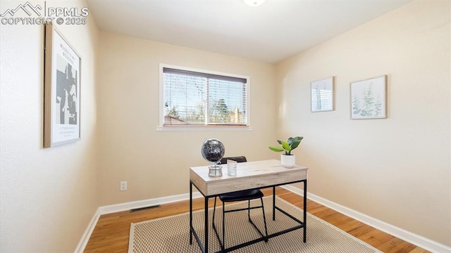 office featuring hardwood / wood-style flooring