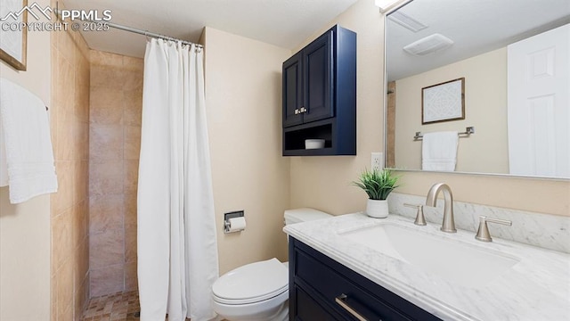 bathroom with walk in shower, vanity, and toilet