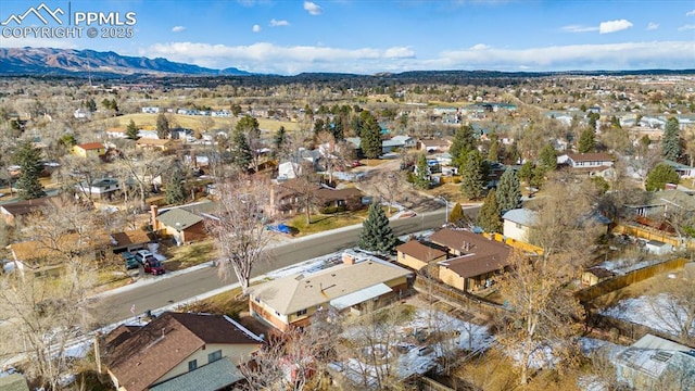 drone / aerial view featuring a mountain view