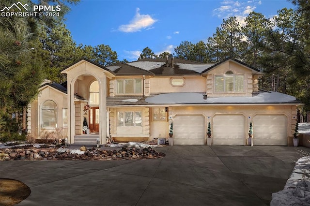 view of front of property featuring a garage