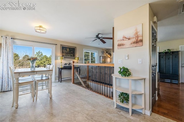 interior space featuring ceiling fan and light hardwood / wood-style flooring