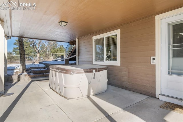 view of patio featuring a hot tub