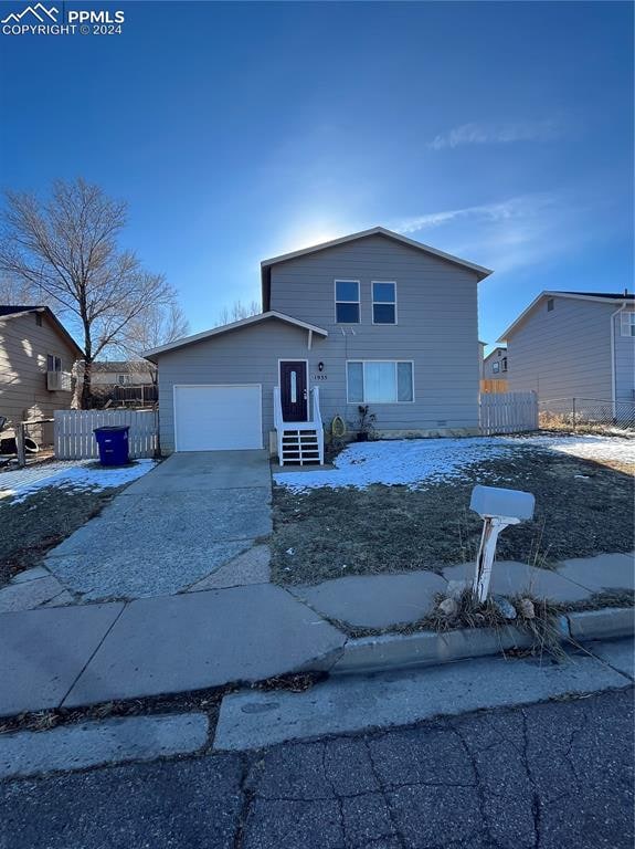 front of property featuring a garage