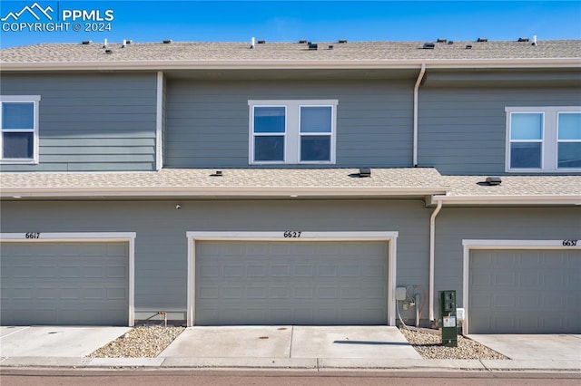 exterior space featuring a garage