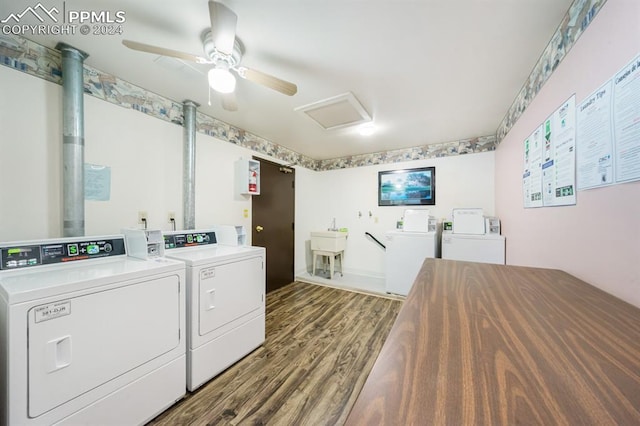 laundry area with washing machine and dryer, ceiling fan, hardwood / wood-style floors, and sink