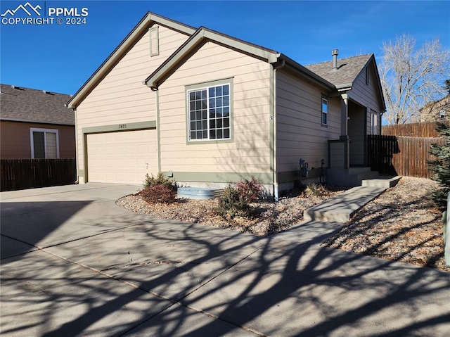 view of front of house with a garage