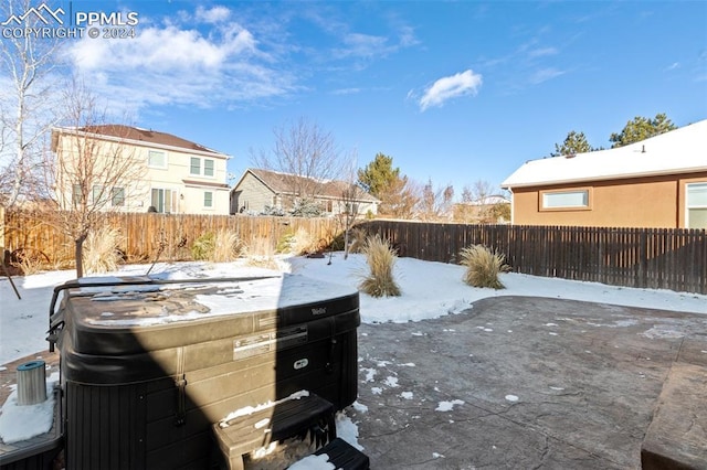 view of yard covered in snow