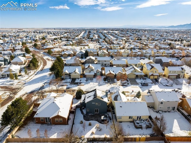 birds eye view of property featuring a mountain view