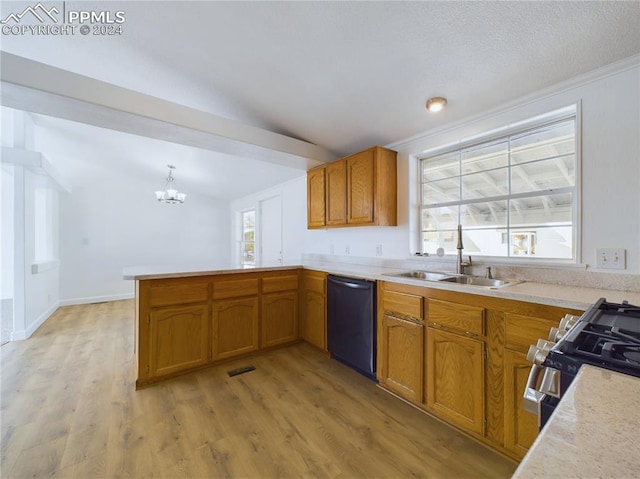 kitchen featuring stainless steel range with gas cooktop, sink, black dishwasher, light hardwood / wood-style floors, and kitchen peninsula