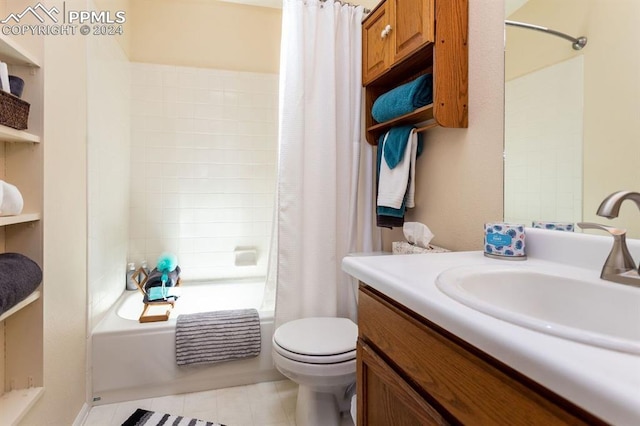 full bathroom featuring toilet, shower / tub combo with curtain, vanity, and tile patterned flooring