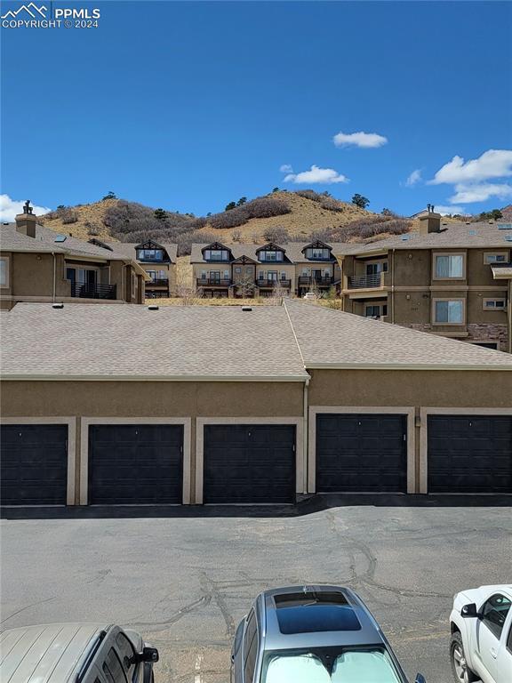 garage featuring a mountain view