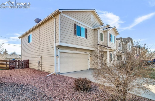 view of front of property with a garage