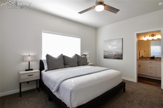 carpeted bedroom featuring connected bathroom and ceiling fan