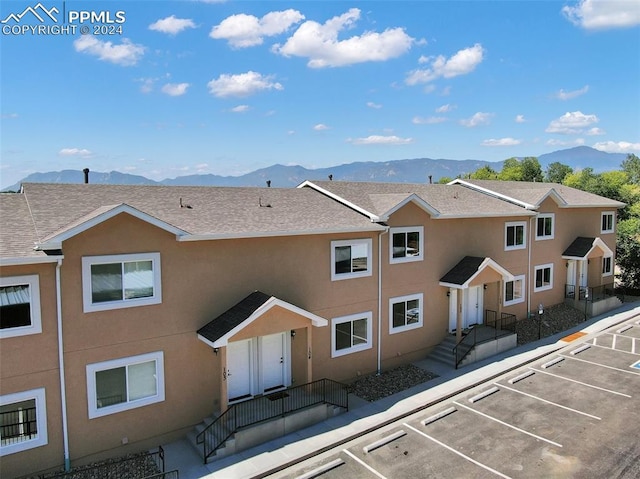 exterior space featuring a mountain view