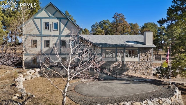 rear view of house featuring a patio