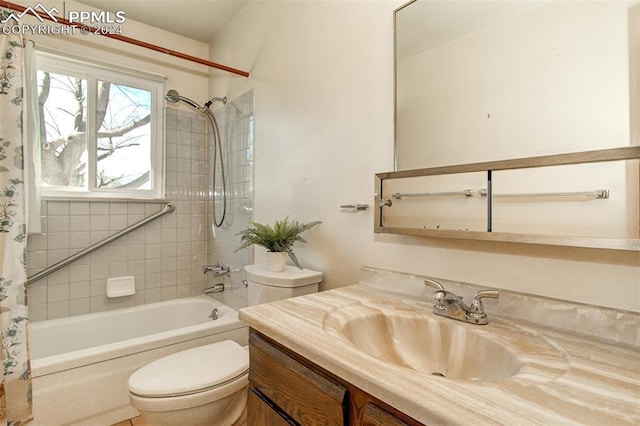 full bathroom featuring vanity, toilet, and shower / bath combo with shower curtain