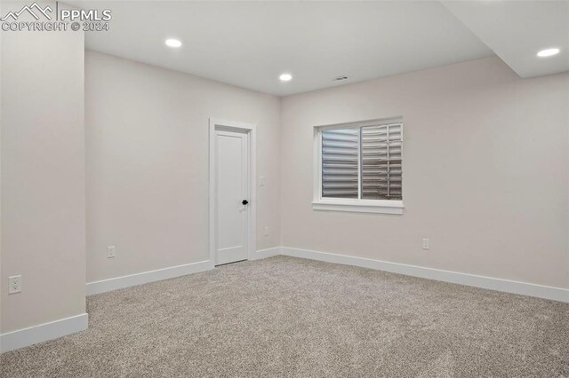 empty room featuring carpet