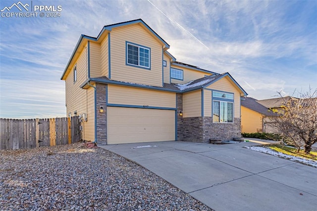 view of front of property featuring a garage