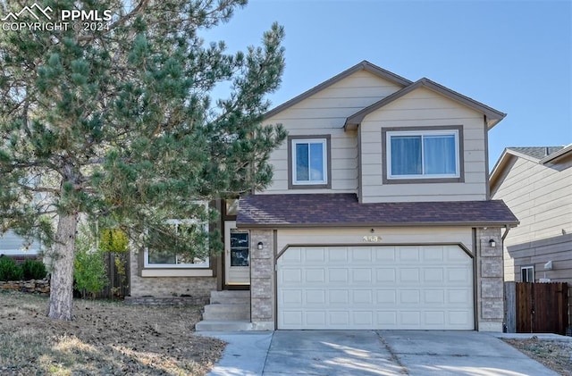 view of front of property featuring a garage